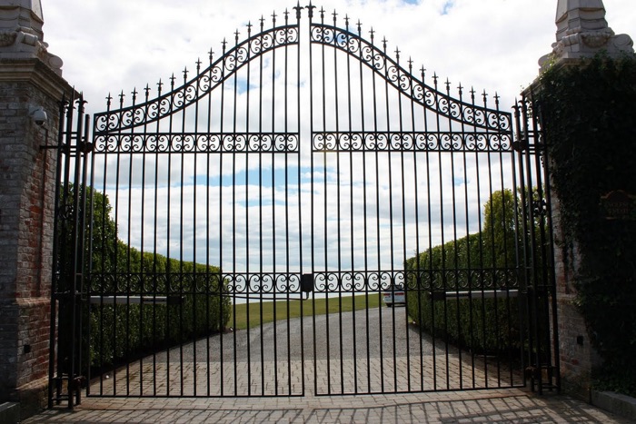 Picture of large gates at private residence. Is Spotify finally closing off access to premium users only?
