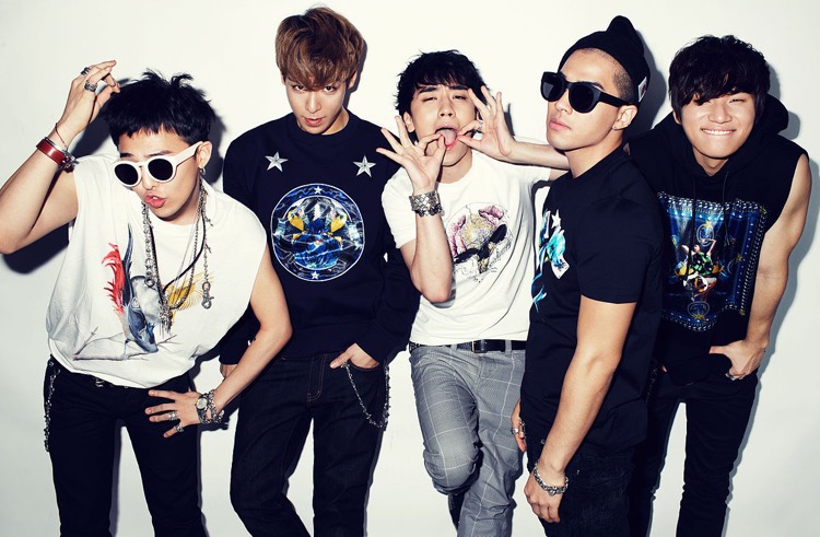 Big Bang members. The group's YouTube subscriber total is now eclipsing rival BTS.
