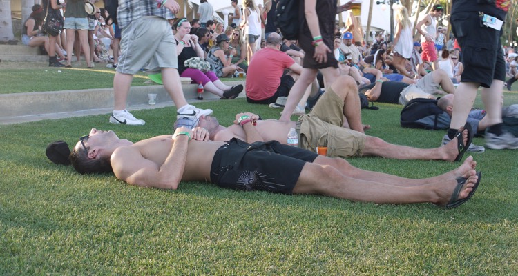 Coachella attendee suffering from what appears to be an acute case of diarrhea.