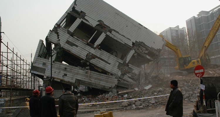 Picture of a collapsing building. Destroy the music industry!