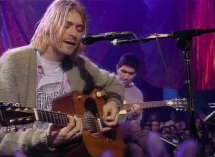 Kurt Cobain of Nirvana plays his 1959 Martin D-18E for the last time in 1993 on MTV's Unplugged.