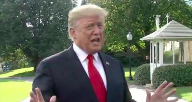 Donald Trump addresses reporters outside the White House on Tuesday, Oct. 9th.