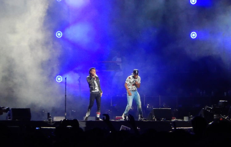 Chance the Rapper (r) performs alongside Vic Mensa at Lollapalooza 2017.