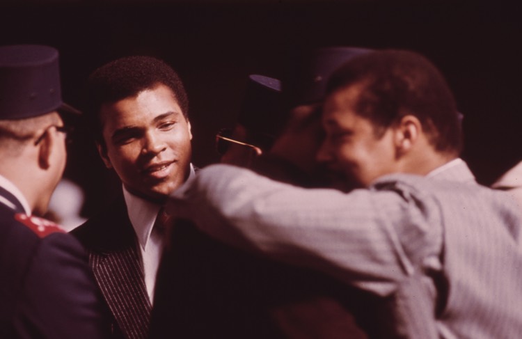 World Heavyweight Boxing Champion Muhammad Ali attends a sermon of Elijah Muhammad, Chicago, 1974 (U.S. National Archives)