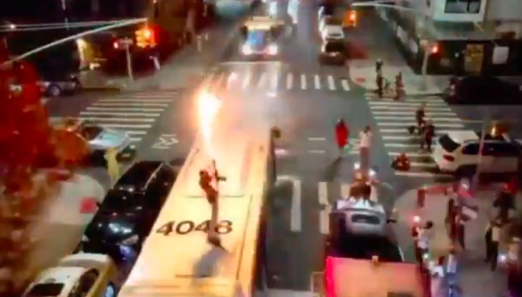 Footage of Dupree G.O.D. shooting the flamethrower atop a New York City bus.