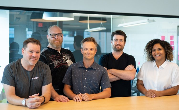 Trolley leadership team, from left, Jordan Cohen (VP Sales), Sasha Kossovsky (VP Engineering, Vincent Guérin (VP Marketing), Tim Nixon (CEO & Founder), and Natalie Loop (VP People & Culture). Not pictured: Andreas Farina Vaz, Annalisa Ceccarelli, Barnett Klane, and Shahina Ali (Photo: Trolley)