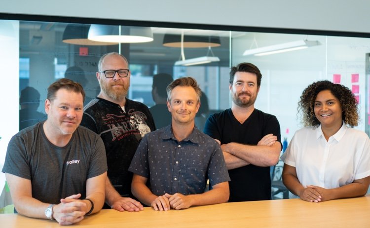 The Trolley leadership team, from left, Jordan Cohen (VP Sales), Sasha Kossovsky (VP Engineering, Vincent Guérin (VP Marketing), Tim Nixon (CEO and Founder), and Natalie Loop (VP People & Culture). Not pictured: Andreas Farina Vaz, Annalisa Ceccarelli, Barnett Klane and Shahina Ali (Photo: Trolley)