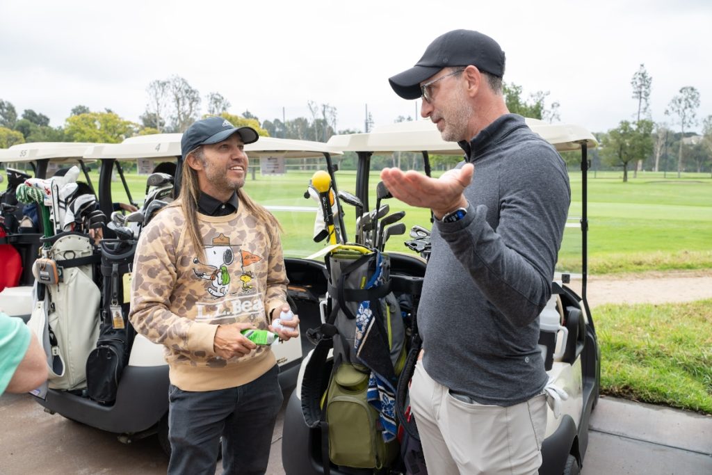 Pete Wentz (left) and NMPA chief David Israelite (right) diplomatically discuss whose drive was actually longer (Photo: NMPA)